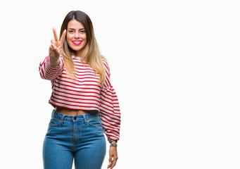 Young beautiful woman casual stripes winter sweater over isolated background showing and pointing up with fingers number two while smiling confident and happy.