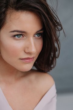 Beauty portrait of attractive young woman looking away
