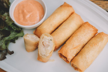 Spring rolls with shrimp with sweet chili sauce. Asian cuisine.