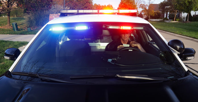 Police: Officer Calls In License From Inside Patrol Car