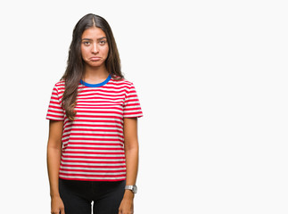 Young beautiful arab woman over isolated background depressed and worry for distress, crying angry and afraid. Sad expression.