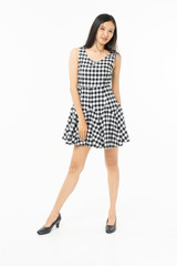  portrait of excited surprised attractive  inspired girl jumping up isolated on background.Freedom legs stylish feet glamorous people teenager asian.