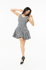  portrait of excited surprised attractive  inspired girl jumping up isolated on background.Freedom legs stylish feet glamorous people teenager asian.