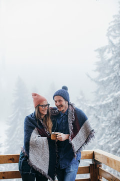 Couple Enjoying Winter Vacation in Mountain