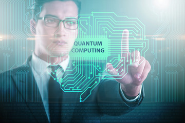Businessman pressing virtual button in quantum computing concept