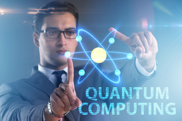 Businessman pressing virtual button in quantum computing concept
