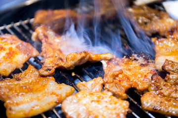 Cooking Korean style barbeque pork and deodeok