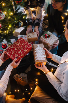 Group of friends spending time together at home for Christmas