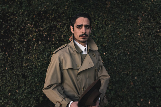 Cinematic Portrait of Man with Old Fashioned Raincoat