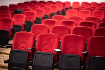 Obraz premium hall with rows of red seats
