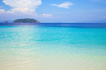 Beautiful beach and tropical sea with clear sky