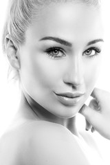 Fototapeta premium Pretty girl close-up portrat, clean skin. Skincare beauty treatment health concept. Black and white