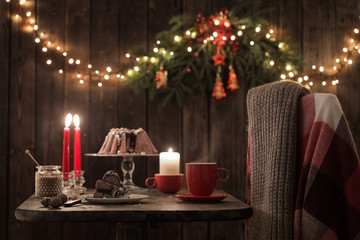 wooden table with Christmas cake and decor