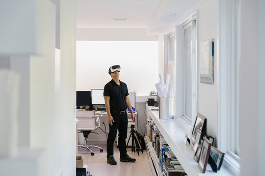 Architect Using Virtual Reality Headset
