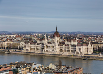 view of the embankment of the river Danube and old Parliament building in Budapest , Hungary