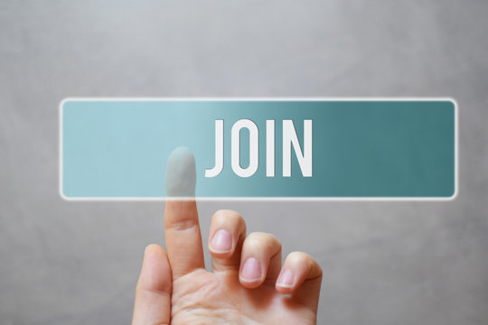 Join - finger pressing blue transparent button on virtual touchscreen interface on gray background with copy space for text. Internet networking business and social media concept.