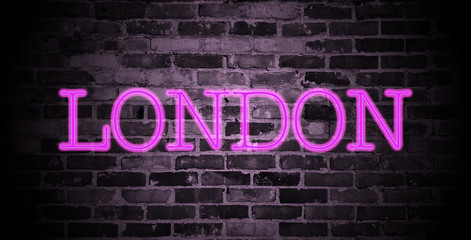Fototapeta na wymiar first name London in pink neon on brick wall
