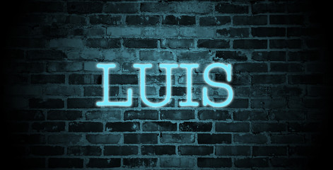 first name Luis in blue neon on brick wall