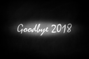 Obraz premium The words goodbye 2018 on blackboard 
