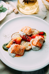 Steak of fish cooked on the grill. Restaurant dishes with a beautiful serving.