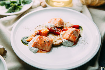 Steak of fish cooked on the grill. Restaurant dishes with a beautiful serving.