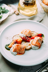 Steak of fish cooked on the grill. Restaurant dishes with a beautiful serving.