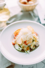 The Caesar salad and the classic shrimp. Restaurant dishes with a beautiful serving.