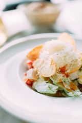 The Caesar salad and the classic shrimp. Restaurant dishes with a beautiful serving.