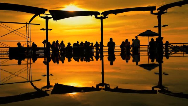 People viewing the sunset at the Larcomar Metropolitan shopping Centre complex Miraflores district Lima Peru South America 