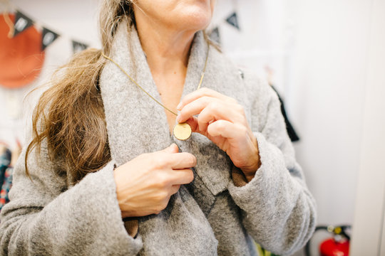 Elderly woman with locket
