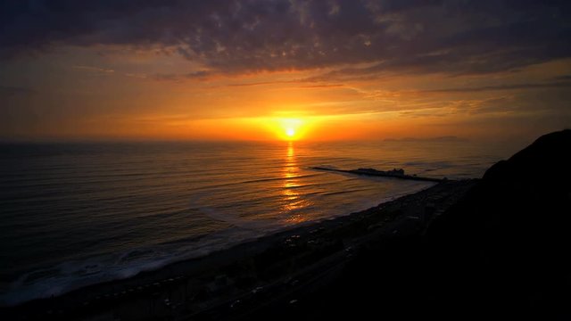 Golden seascape sunset over the Miraflores Latin American coastal beach Region of Lima Peru South America 