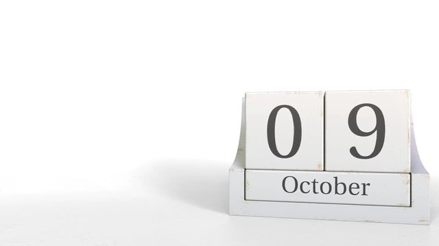 Wooden blocks calendar shows October 9 date, 3D animation