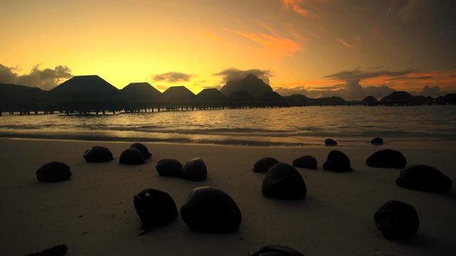 Bora Bora Island beach at sunset lagoon luxury resort Overwater Bungalows in tropical Tahitian Paradise South Pacific French Polynesia