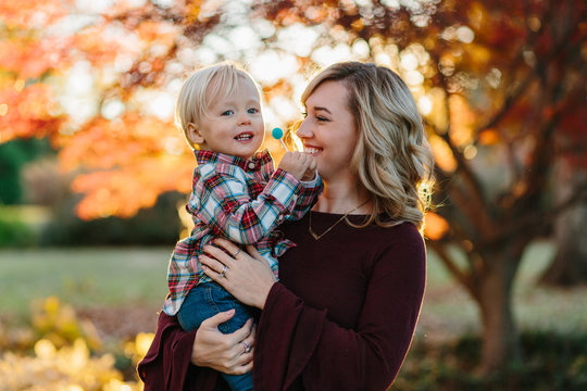 Mother and son smiling and laughing together