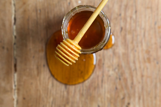 Jar of Honey with Honey Dipper