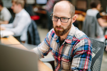 Various happenings at a technology company office