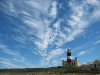 Fototapeta na wymiar The lighthouse near Cape Agulhas, the most southern point of Africa, South Africa