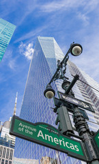 Street sign at the Avenue of the Americas in New York City, USA
