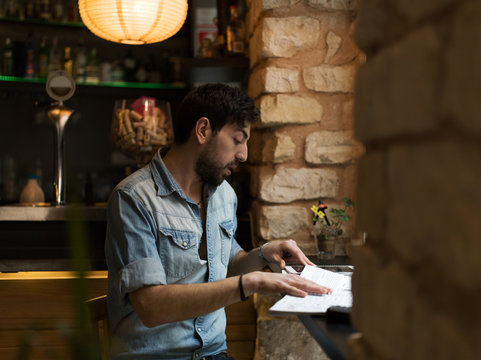 Bar owner running on business