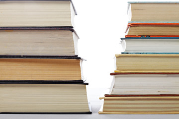 Serious books against fiction closeup