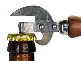 Close up of stopper of beer bottle and can opener