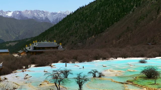 Travertine landscapes and pools of Huanglong (literally: yellow dragon), Sichuan, China. Huanglong was declared a World Heritage Site by UNESCO in 1992.