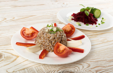 Buckwheat Porridge or Russian Kasha on Wood Rustic Background