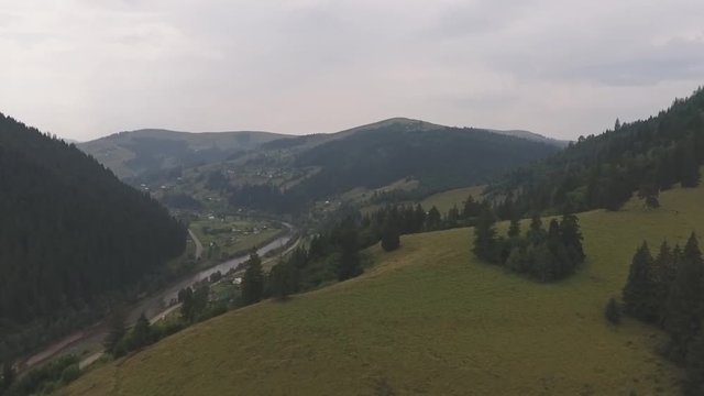 Aerial Drone Footage View: foggy Mountain village in Carpathians