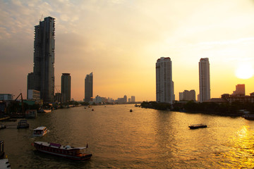 Fototapeta premium Cityscape and River sunset Bangkok city skyline Asia Thailand 