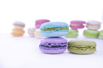 Colourful french macaroons or macaron on white background, Dessert