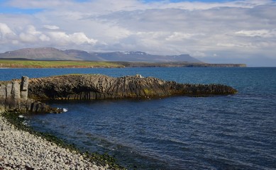 Icelandic landscape at Kalfshamarsvik on peninsula Skagi with basalt rocks.