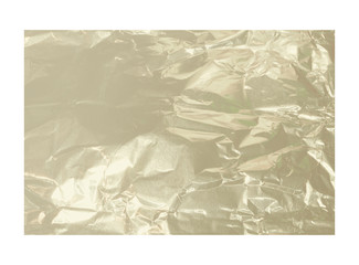 Silver crumpled foil texture isolated on white background