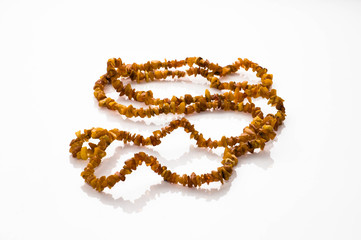 Amber necklace isolated on white background