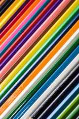 Colorful school supplies, colorful pencils background, back to school concept